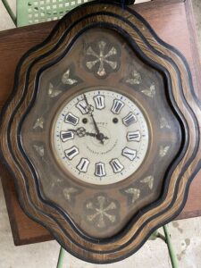 Horloge œil de bœuf