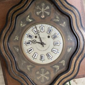 Horloge œil de bœuf